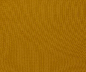 fabric texture mustard background yellow color selective focus