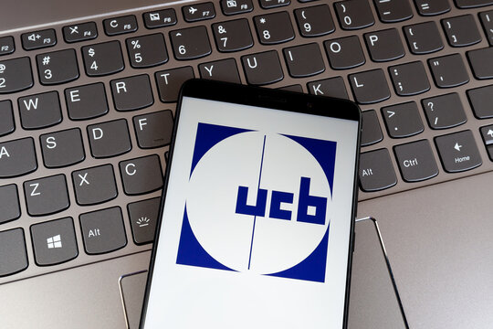 Toronto, Canada - January 31, 2021: UCB logo on smartphone screen on keyboard. UCB is a global biopharmaceutical company headquartered in Belgium. 