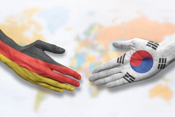 South Korea and Germany - Flag handshake symbolizing partnership and cooperation