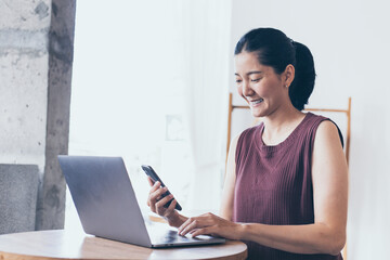  work using typing computer texting cell phone.student study education online learning.adult professional chatting on laptop,mobile contact us at Thinking business plan.connecting people concept