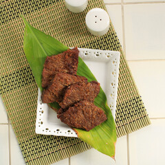 Empal gepuk or sometimes simply known just as empal or gepuk is an Indonesian sweet and spicy fried...