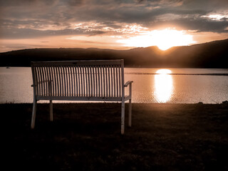 Fototapeta na wymiar bench in the sunset