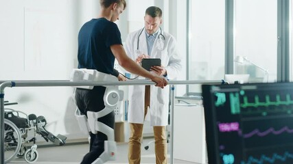Modern Hospital Physical Therapy: Doctor Uses Tablet Computer, Helps Disabled Patient with Injury Walk on Treadmill Wearing Advanced Robotic Exoskeleton Legs. Physiotherapy Rehabilitation Technology - Powered by Adobe