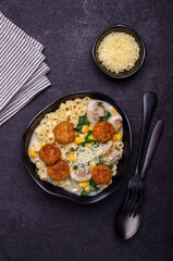 Pasta with vegetables and meatballs