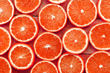 Orange slices texture background, Fresh orange fruits orange pattern on wooden background