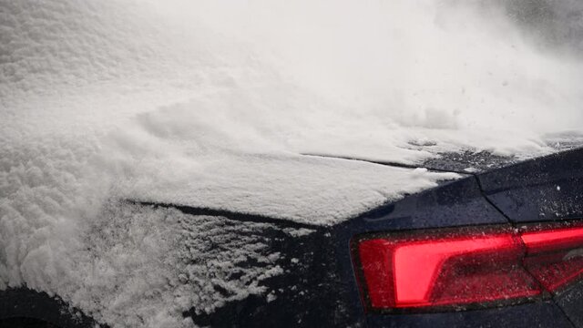 Blowing Off Snow From a Car Using Electric Cordless Air Blower