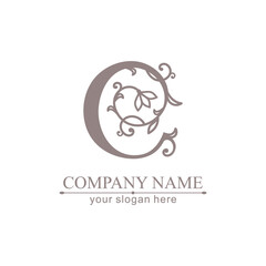 Premium Vector C logo. Monnogram, lettering. Delicate elegant floral pattern of roses. Personal logo or sign for branding an elite company. Vector design.