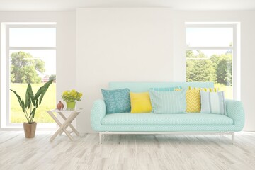 White living room with sofa and summer landscape in window. Scandinavian interior design. 3D illustration