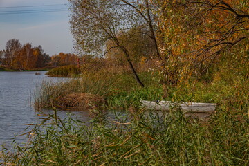 Boat on the autumn river