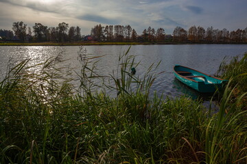 Boat on the autumn river
