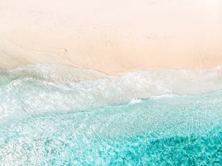 Türaufkleber Aerial view of clear sea waves and white sandy beach in summer. © satit