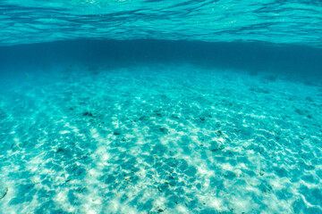 Underwater of tropical; sun rays passing through water.