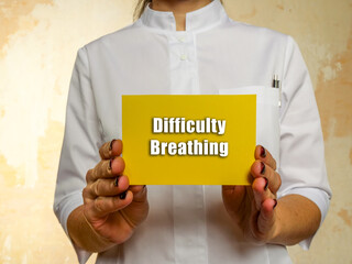 Healthcare concept meaning Difficulty Breathing with sign on the piece of paper.