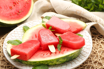 Composition with watermelon ice cream on table