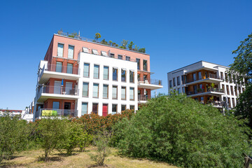 Modern apartment houses in a green surrounding in Berlin, Germany