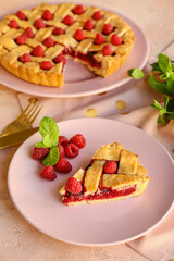 Delicious raspberry pie on light table