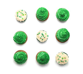 Tasty cupcakes for St. Patrick's Day on white background