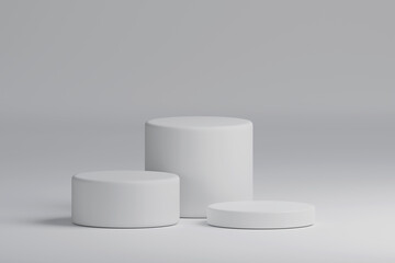 Three white cylinder product stage podium background. Minimal fashion theme. Geometry concept. Exhibition and business marketing presentation stage. 3D illustration rendering graphic design