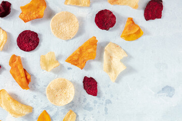 Fruit and vegetable chips, a flat lay shot with a place for text