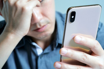 The young man was stressed and uncomfortable. And angry at the phones of the people who are being...