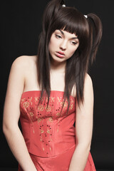 Naklejka premium portrait of beautiful young woman posing
