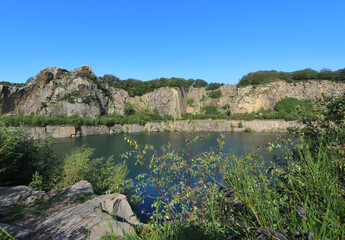 Fototapeta na wymiar lake with a rocky shore on Bornholm