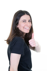 smiling cute woman with thumbs up laughing on white background