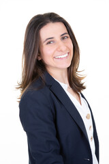 Happy young business woman in suit posing isolated over white wall background