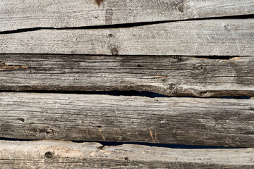 Old raw faded textured wood boards.