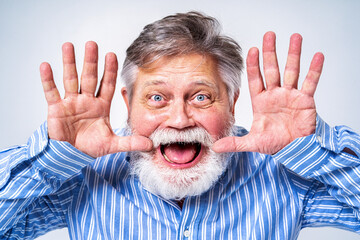 Senior man with funny expression portrait