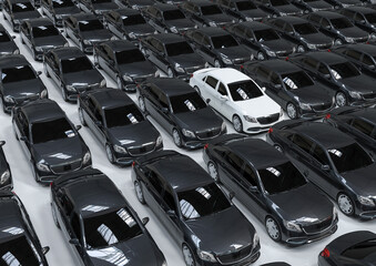 Fototapeta premium 3D render image of a fleet of luxury car with one in different color representing unique concept
