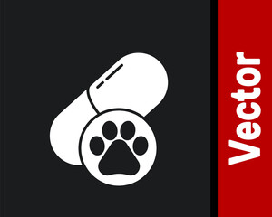 White Dog pill icon isolated on black background. Prescription medicine for animal. Vector.
