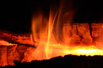 burning fire in fireplace on a cold winters day
