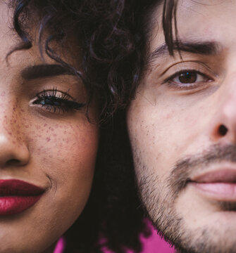 Multiethnic couple together, faces close up