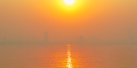 Panoramic view of Fishing boats in Arabian sea at sunrise - Mumbai, india