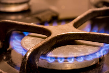 Burning flames on a gas burner gas stove