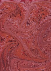 Abstract paper marbled background in reds, with swirls and textures