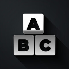 Silver ABC blocks icon isolated on black background. Alphabet cubes with letters A,B,C. Long shadow style. Vector.