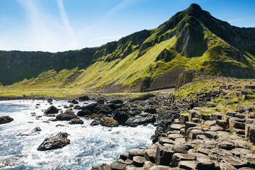 Landscape of Giant's Causeway trail with a blue sky in summer in Northern Ireland, County Antrim....