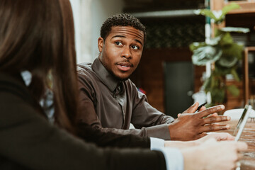 Diverse businesspeople in the meeting room