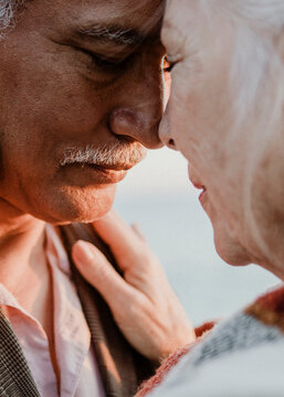Romantic senior couple by the pier