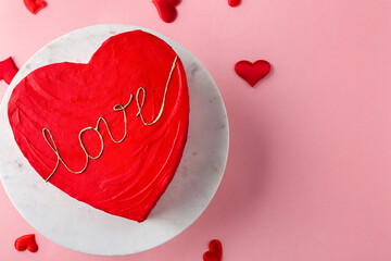 Heart cake for St. Valentine's Day, Mother's Day, or Birthday on cake stand. pink background