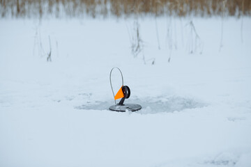 tackle with a red flag for winter fishing