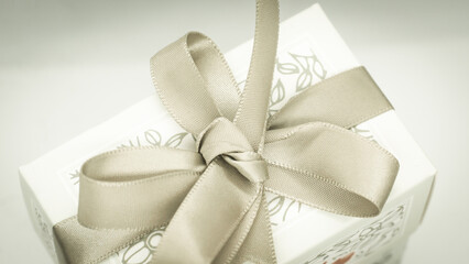 Grey gift box with grey bow for a fun holiday or birthday party