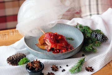 Meat under a glass cloche with sauce giving about the steam. Lunch time