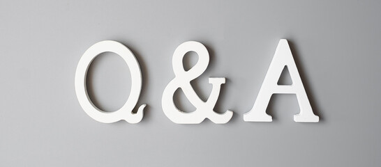 Q and A text on gray background. FAQ( frequency asked questions), Answer, Question and Ask,...