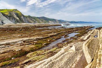 Fototapeta na wymiar Flysch in the coast of Zumaia, Basque Coast Unesco Geopark, Spain.