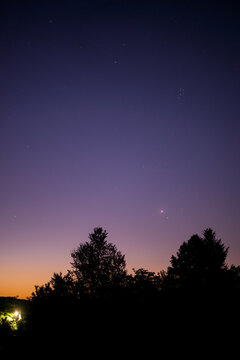 the constellations hyades and pleiades in the night sky with planet venus right in center of taurus