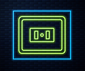 Glowing neon line Electrical outlet icon isolated on brick wall background. Power socket. Rosette symbol. Vector.