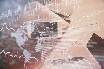 Multi exposure of forex graph hologram over desktop with phone. Top view. Mobile trade platform concept.